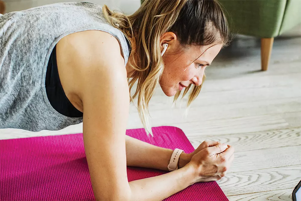 close up image of a woman doing plank exercise
