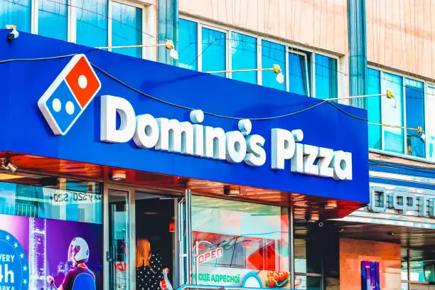 Dominos pizza' logo, Domino's Pizza is an American multinational pizza restaurant chain